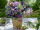 Early summer bouquet of garden perennials: Veronica (Speedwell), Geranium