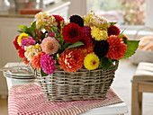 Basket with dahlia (dahlias), flower arrangement