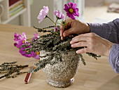 Arrangement with decorative basket and lichen-covered branches (4/5)