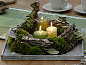 Rustic Advent wreath made from souvenirs from a walk in the woods