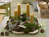 Advent wreath made of natural materials from a walk in the woods
