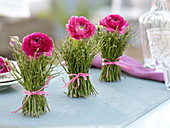 Ranunculus in dress made of blueberry branches (3/3)