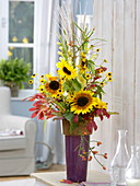 Autumn bouquet with Helianthus (sunflowers), Rosa (rosehips)