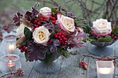 Autumn bouquet in hoar frost: pink (roses), skimmia (fruit cimmia), leaves