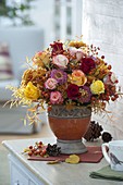 Autumn bouquet with pink (roses, rosehips), Chrysanthemum