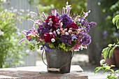 Early summer bouquet with Paeonia (peonies), Allium (ornamental leeks), Aquilegia