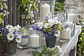 Evening decoration prepared, glasses with candles as lanterns