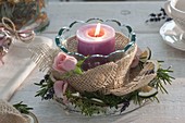 Naturally decorated lantern with jute ribbon, rosemary wreath