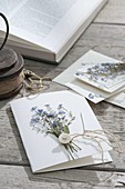 Greeting card design with pressed forget-me-nots