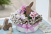 Easter nest in enamel pot with wreath made of salix (palm kitten)