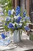 Blue and white bouquet in zinc jug delphinium, Campanula