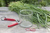 Colorful spring bouquet in grass coat vase