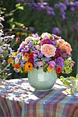 Colorful bouquet of pink (rose), Zinnia (Zinnia), Ageratum