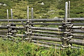 Austrian cattle fence in the Tyrolean Alps, very sturdily built to keep out snowdrifts even in winter