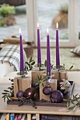 Unusual Advent decoration, candle holder on wooden blocks