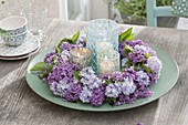 Plate Wreath Of Lilac Flowers With Lantern