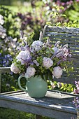 Spring summer bouquet of Paeonia (peonies), Aquilegia (columbine)