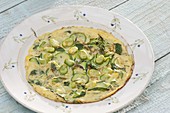 Frittata with courgettes, broad beans and herbs