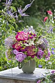 Lush bouquet with Paeonia, Allium, Filipendula