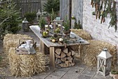 Rural winter terrace with straw bales to sit on