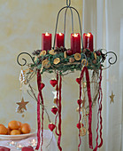 Hanging advent wreath with ribbons and hearts