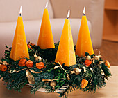 Advent wreath made of pine branches, boxwood and fir branches