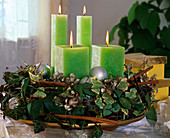 Advent wreath made of Hedera, Hydrangea, willow twigs, cinnamon sticks