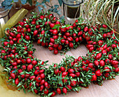 Rosehip wreath in the shape of a heart
