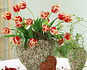 Bouquet of tulips in heart vase, decorative heart
