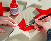 Homemade wooden star. Paint with weatherproof acrylic paint