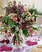 Spring bouquet with Syringa (lilac), Malus (ornamental apple)