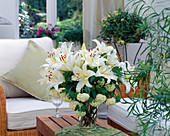 Bouquet with lilies and viburnum (snowball)