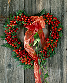 Door wreath: Heart of rose hips (Rosa and twigs of Thuja) Tree of life