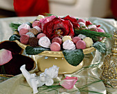 Bowl with sugared rose petals and leaf pralines