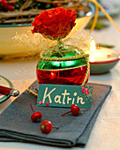 Place card with tree ball and rose petal