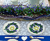 Garland and plate decoration with forget-me-nots
