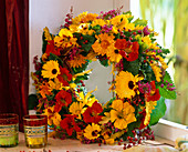 Wreath made of wet floral foam with calendula (marigold)