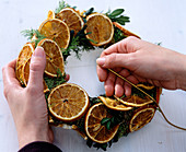 Orange slice wreath (3/4). Finished wreath decorated with citrus (orange slices).