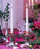 Eucalyptus, Rosa (roses), Pinus (pine), balls, silver candlesticks, candles