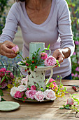 Homemade cake stand with rose petals