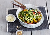 Vegetarian courgette pasta salad with yellow pepper and olives