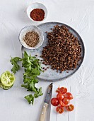 Brown lentils and raw and cooked bulgur
