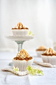 Apple caramel cupcakes with streusel, buttercream frosting and caramel sauce
