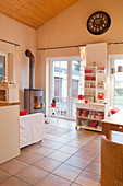 Open-plan interior decorated in white and red