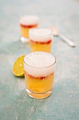 Wheat beer punch with a lime foam