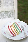 A piece of rainbow cake