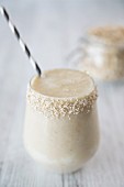 A power smoothie with almond milk, banana and oats