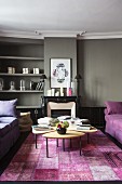 Vintage rug and fireplace in elegant lounge in period building