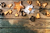 Homemade Christmas shortbread star shape sugar cookies with sugar powder and cookie cutters