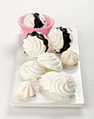 Meringues with chocolate sauce